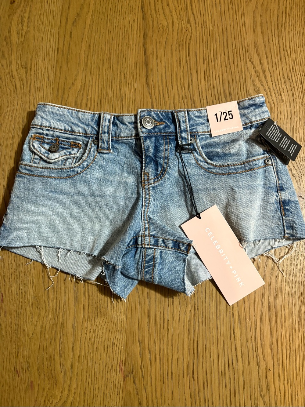 Celebrity Pink Light Blue Distressed Denim Cutoff Shorts
